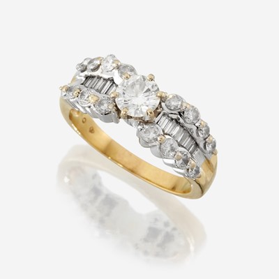 Lot 35 - A diamond and eighteen karat two tone gold ring
