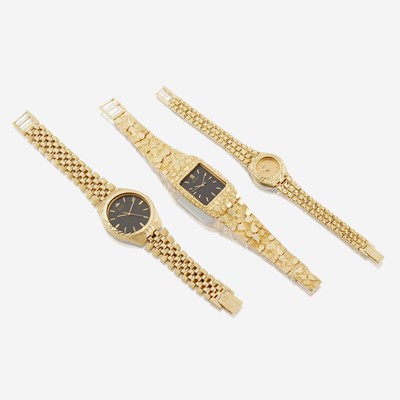 Lot 193 - A group of three metal and fourteen karat gold wristwatches, Seiko