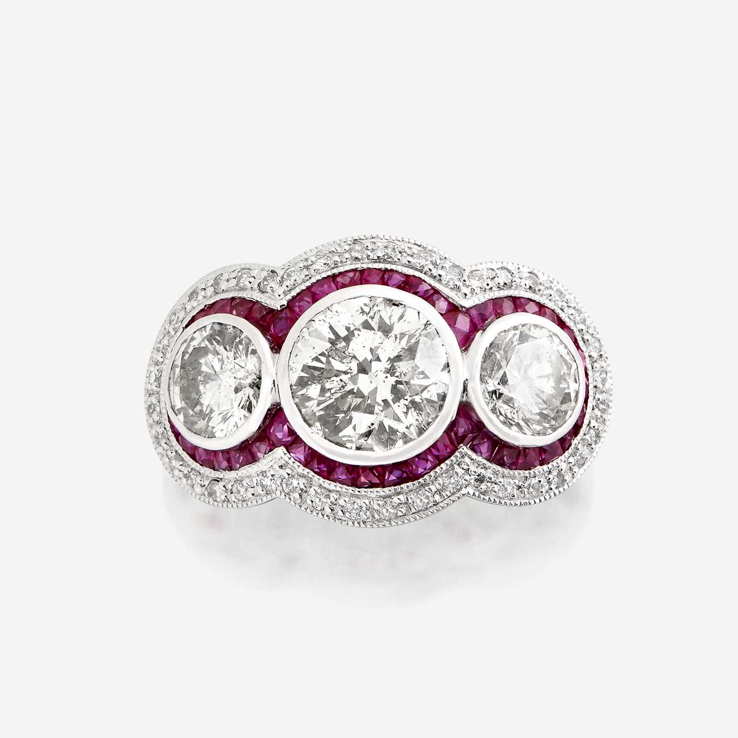 Lot 99 - A diamond, ruby, and platinum ring