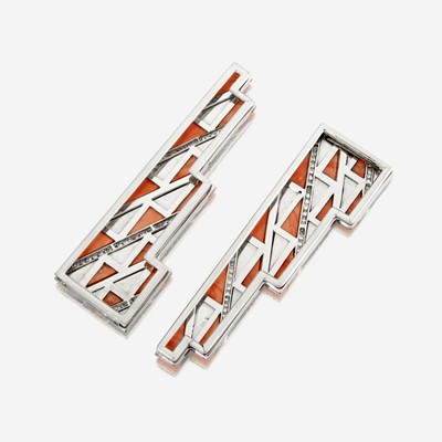 Lot 144 - A pair of coral, diamond, enamel, and platinum clips