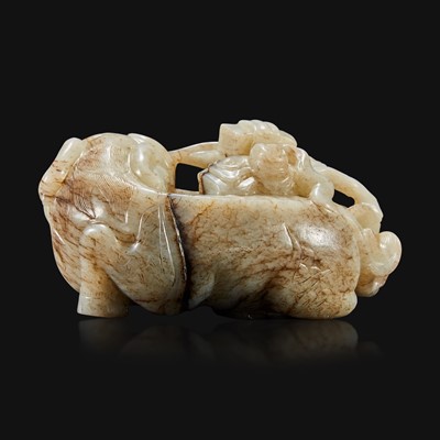 Lot 88 - A Chinese carved jade figure of recumbent qilin