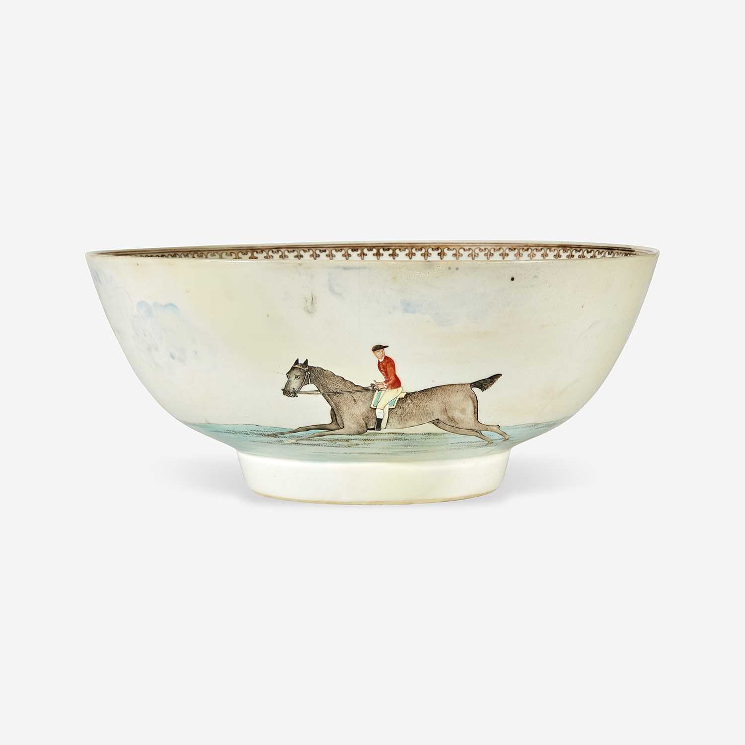 Lot 94 - A Chinese Export porcelain gilt and polychrome decorated punch bowl with horses and riders