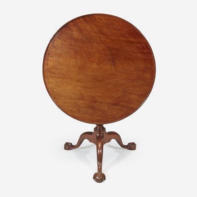 Lot 55 - A Chippendale carved mahogany tilt-top tea table