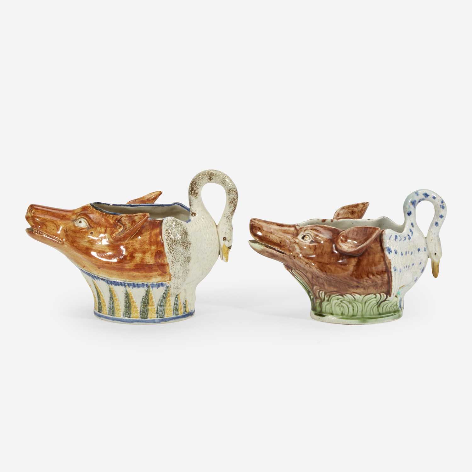 Lot 83 - Two English fox and goose pearlware sauce boats