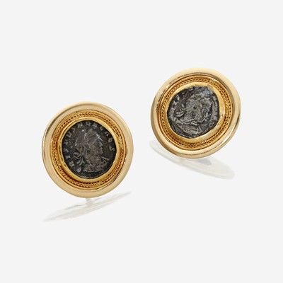 Lot 28 - A pair of fourteen karat gold and coin earclips