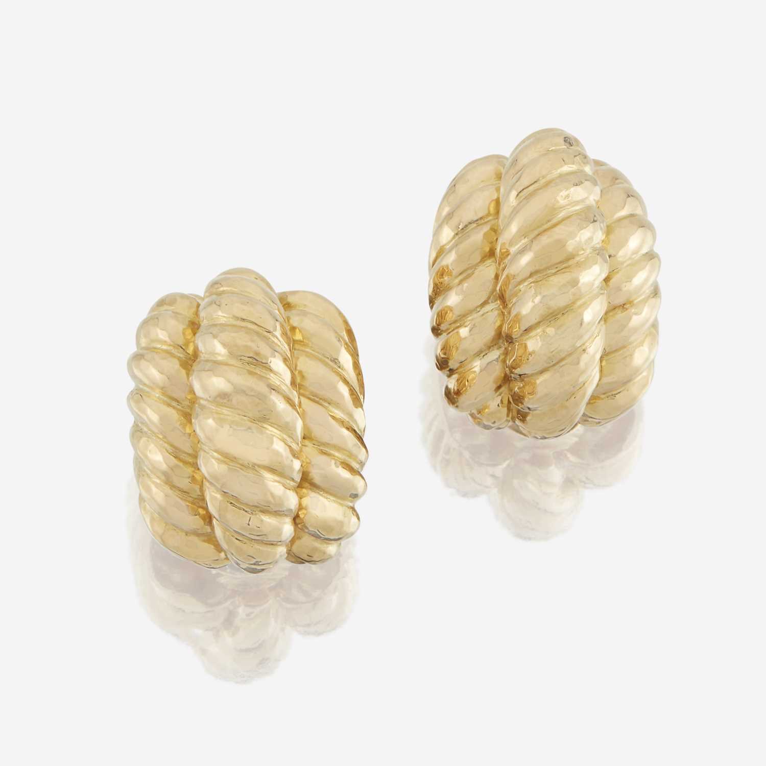 Lot 116 - A pair of eighteen karat gold earrings, David Webb