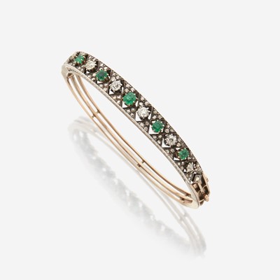 Lot 4 - An antique diamond and emerald bangle