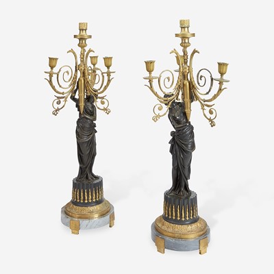 Lot 163 - A Pair of Louis XVI Style Gilt and Patinated Bronze Figural Four-Light Candelabra