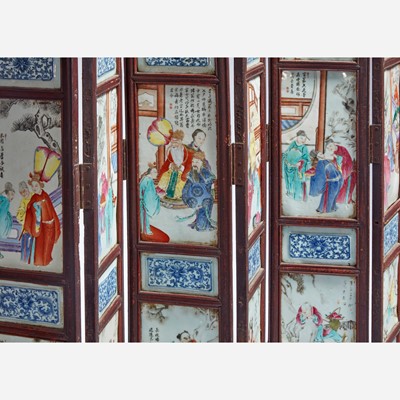 Lot 80 - A Chinese famille rose-porcelain mounted eight-panel screen