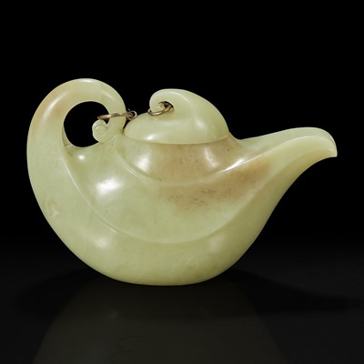 Lot 109 - A Chinese yellowish-celadon jade teapot and cover 青黄玉雕带盖茶壶