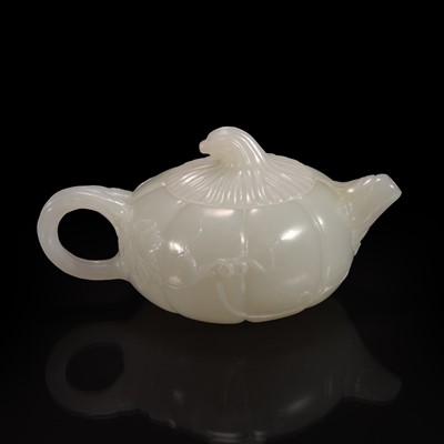 Lot 116 - A small Chinese white jade melon-form teapot 瓜形玉茶壶