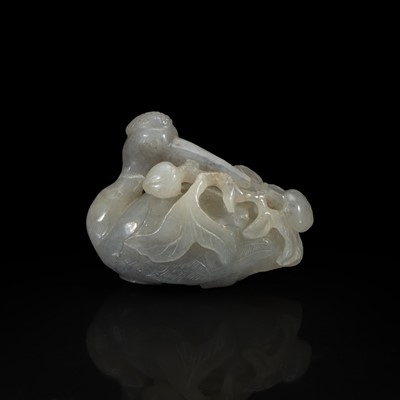 Lot 111 - A Chinese pale grey jade crane and peaches group 灰玉雕仙鹤衔仙桃