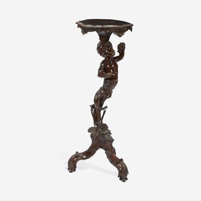 Lot 104 - A George II Carved Mahogany Figural Tripod Table