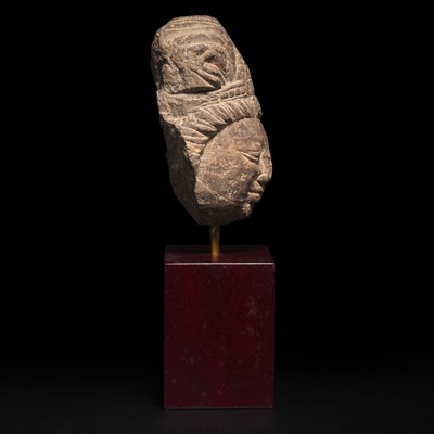 Lot 155 - A carved stone head, possibly Shiva 石雕佛首, 或湿婆神