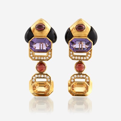 Lot 81 - A pair of eighteen karat gold and gem-set ear pendants