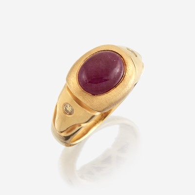 Lot 48 - A twenty-two karat gold, ruby, and colored diamond ring