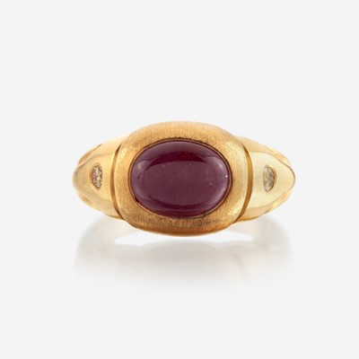 Lot 48 - A twenty-two karat gold, ruby, and colored diamond ring
