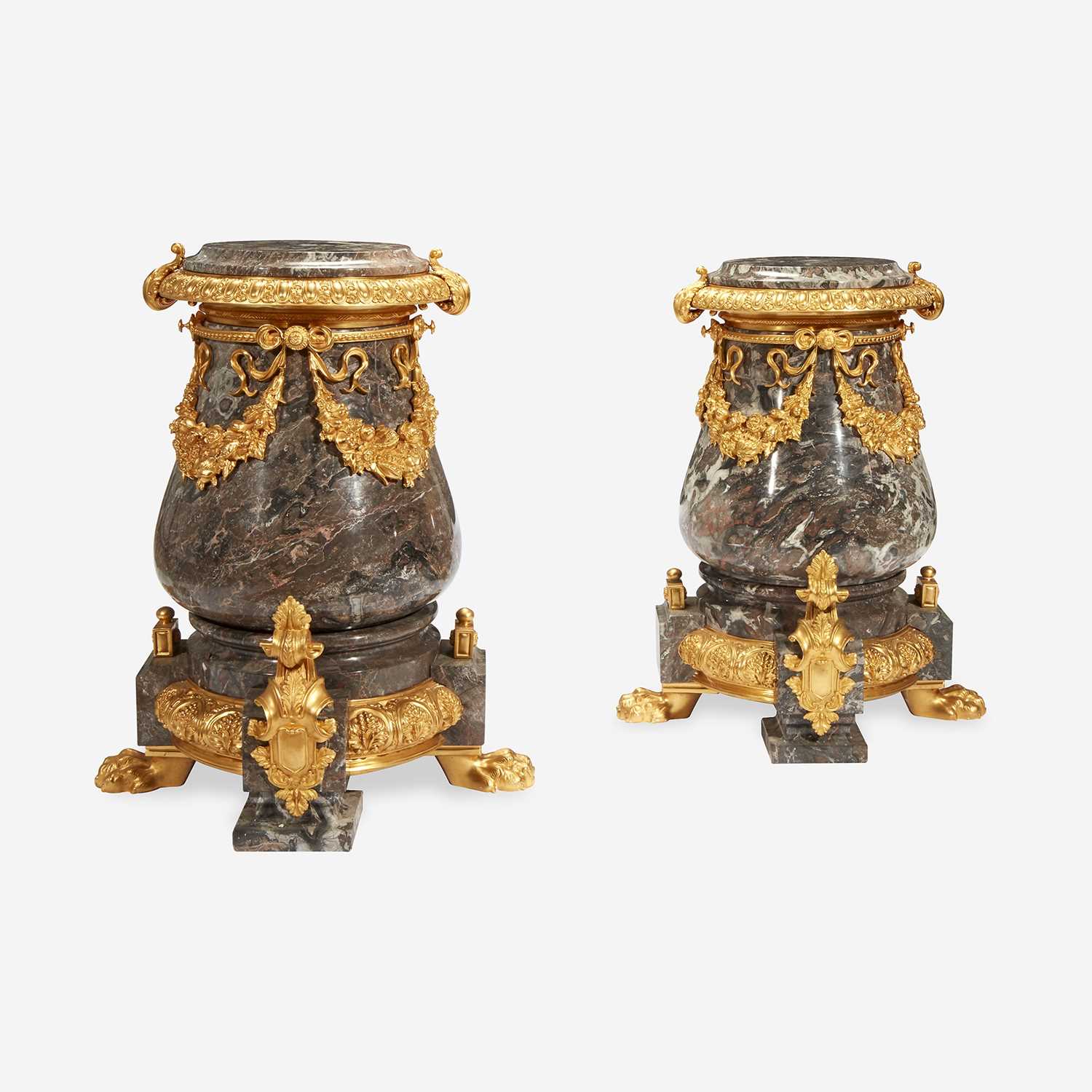 Lot 13 - A Pair of Gilt Metal Mounted Variegated Gray Marble Pedestals