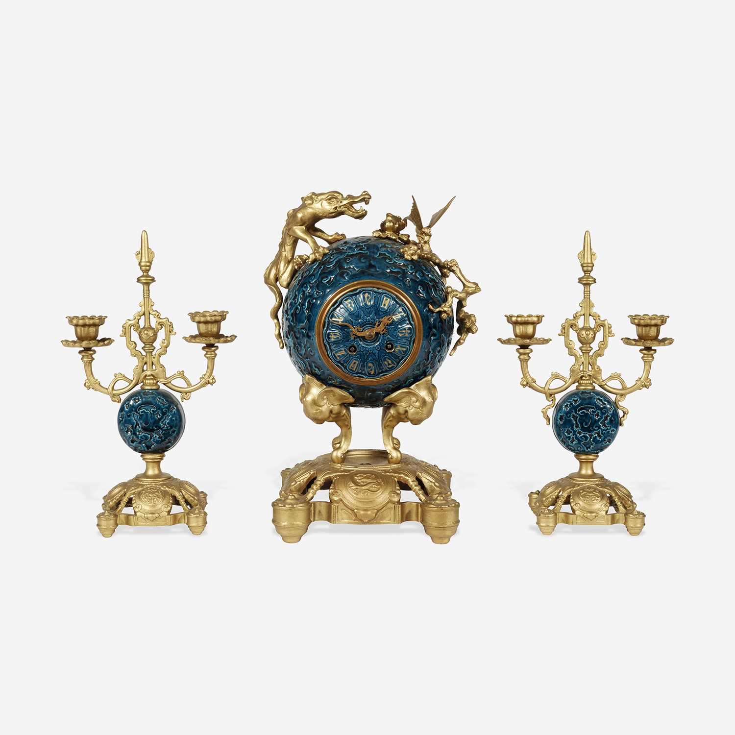 Lot 73 - A Chinese Style Enameled Porcelain and Gilt-Bronze Mounted Clock Garniture