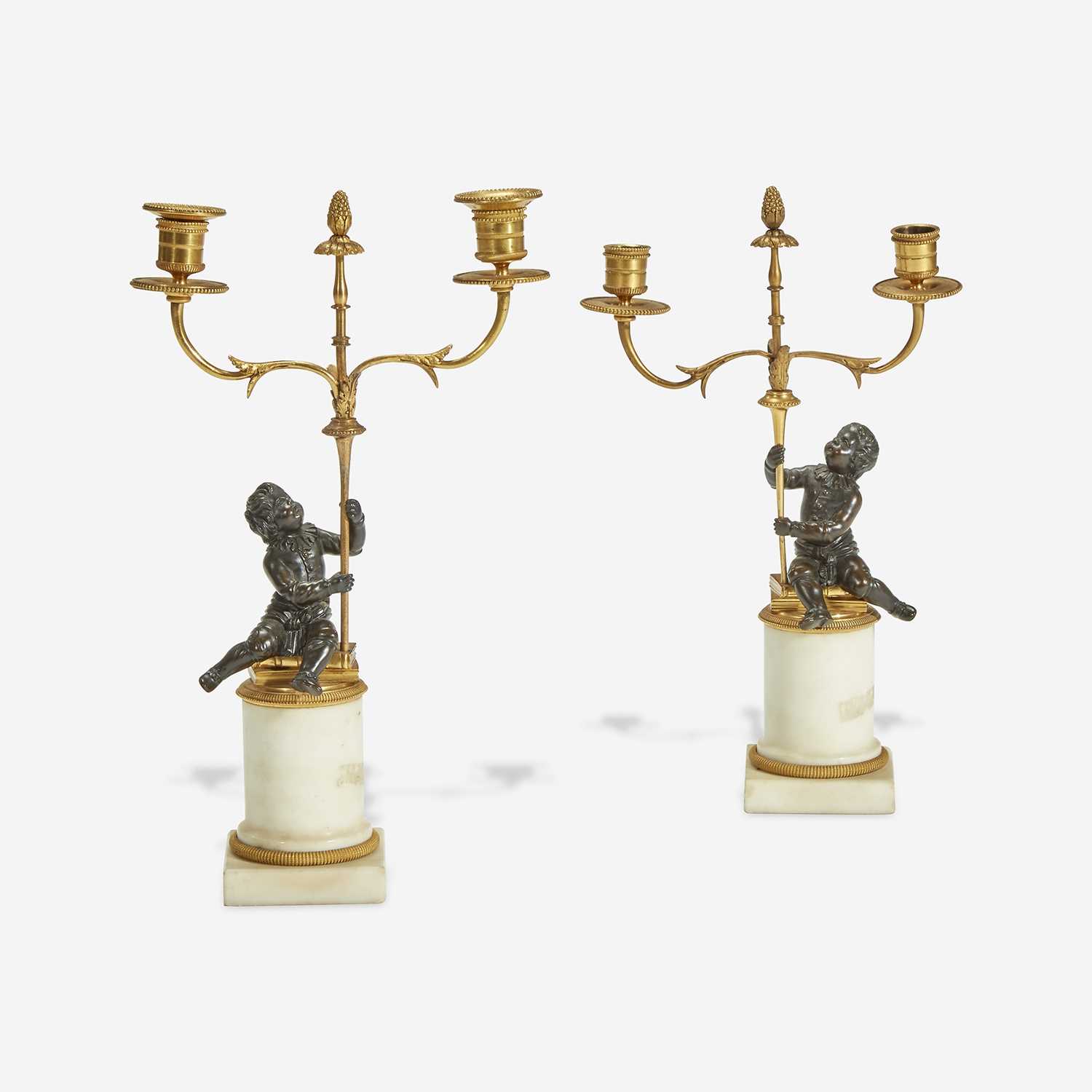 Lot 30 - A Louis XVI Style Gilt and Patinated Bronze Candelabra