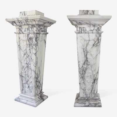 Lot 250 - A Large Pair of Variegated White Marble Pedestals*