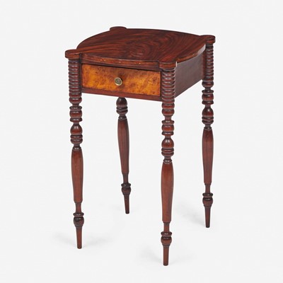 Lot 174 - A late Federal figured mahogany and maple work table