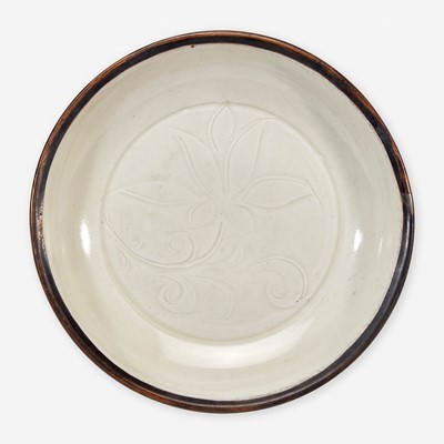 Lot 1 - A small Chinese Dingyao incised "Lotus" dish 定窑刻划莲花小盘