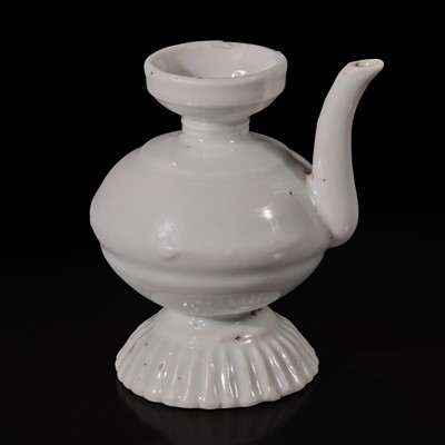 Lot 6 - A small Chinese white glazed porcelain ewer 白釉小壶