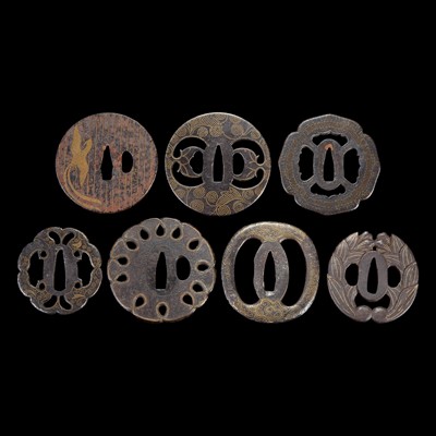 Lot 214 - Group of seven Japanese inlaid iron tsuba