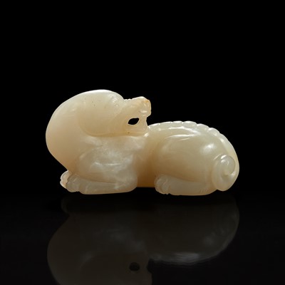 Lot 129 - A Small Chinese carved grayish white jade figure of mythical beast 白玉小瑞兽