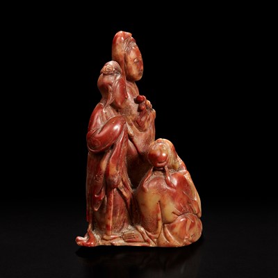 Lot 138 - A Chinese carved soapstone figural group