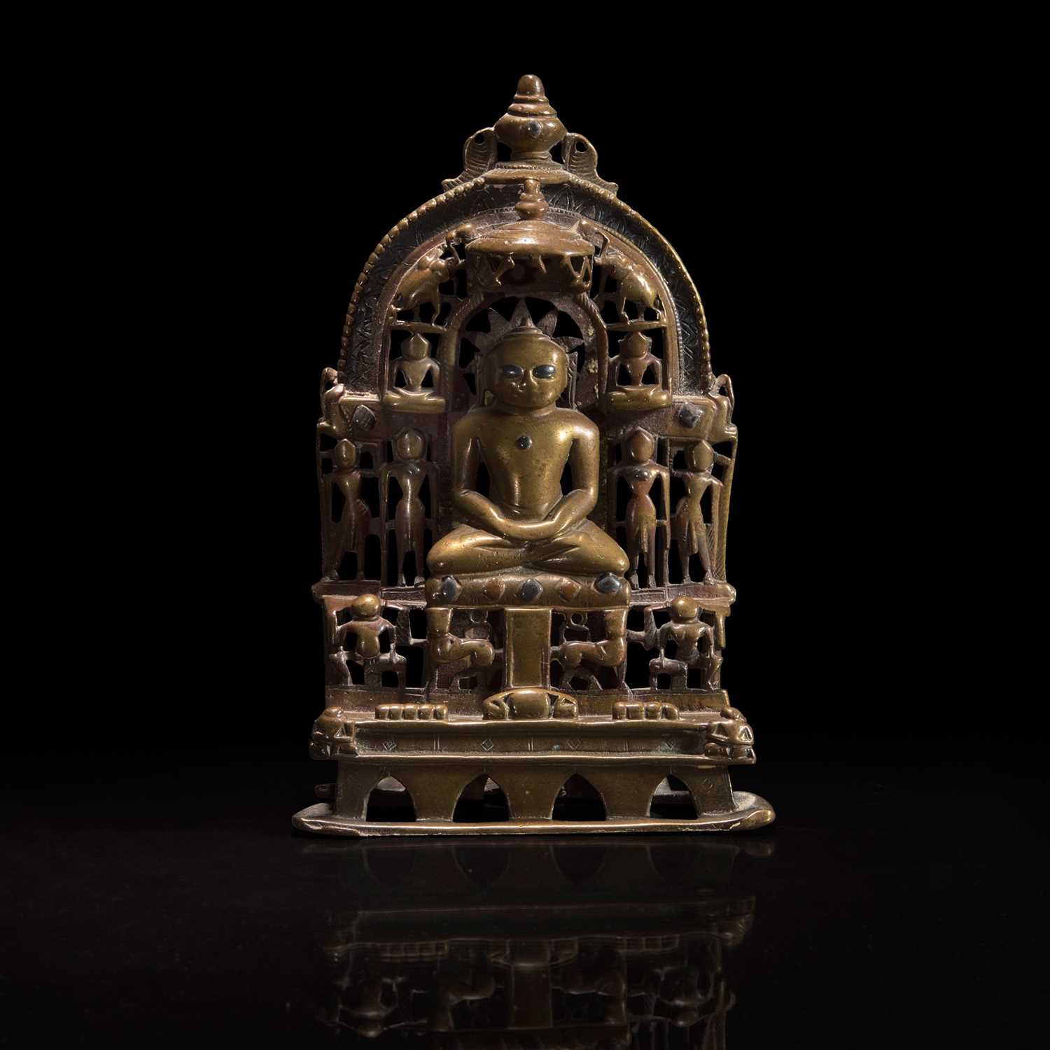 Lot 168 - An Indian silver-inlaid brass Jain Shrine 印度耆那教铜嵌银神龛