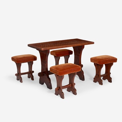 Lot 102 - An Arts & Crafts Gnomeman Oak Table with Four Conforming Stools