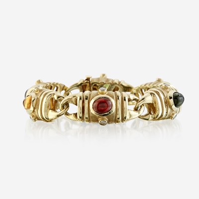 Lot 83 - A fourteen karat gold and gem-set bracelet