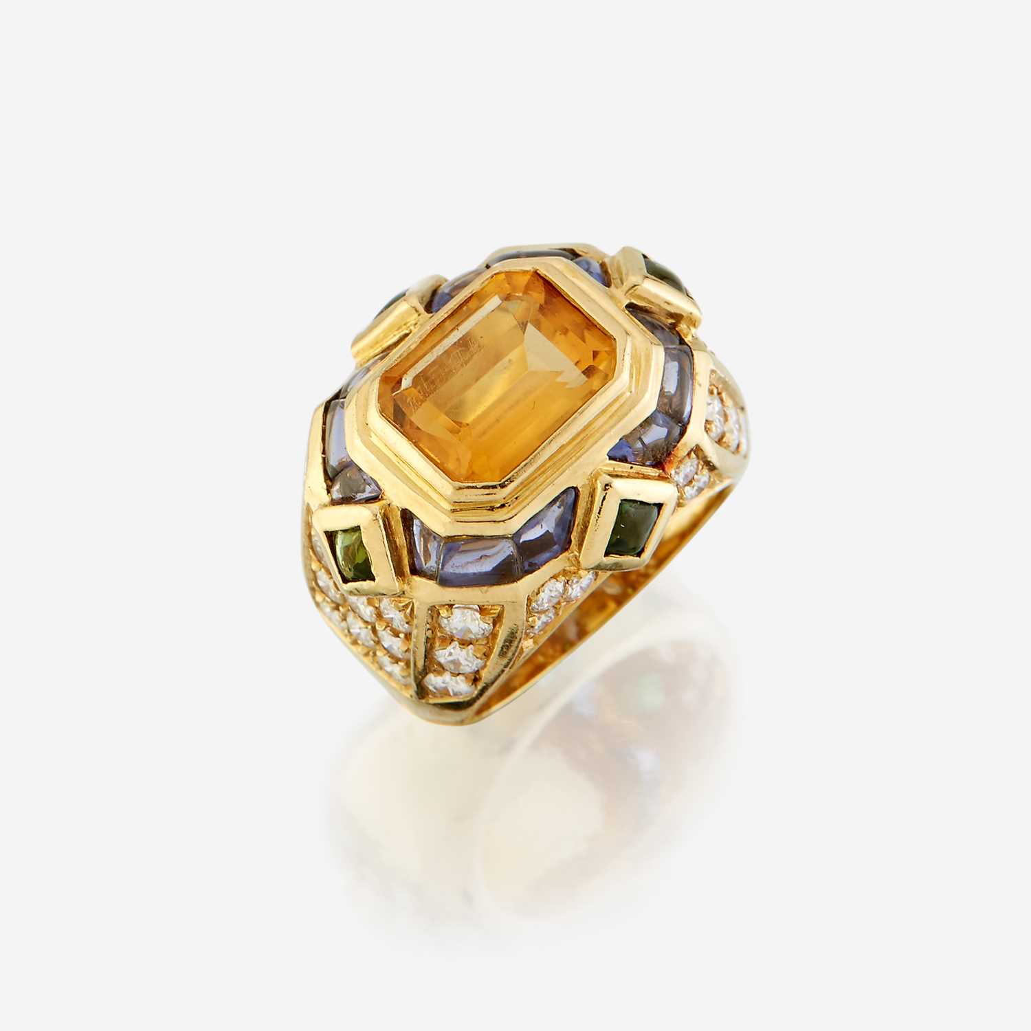 Lot 82 - A citrine, diamond, sapphire, peridot, and eighteen karat gold ring