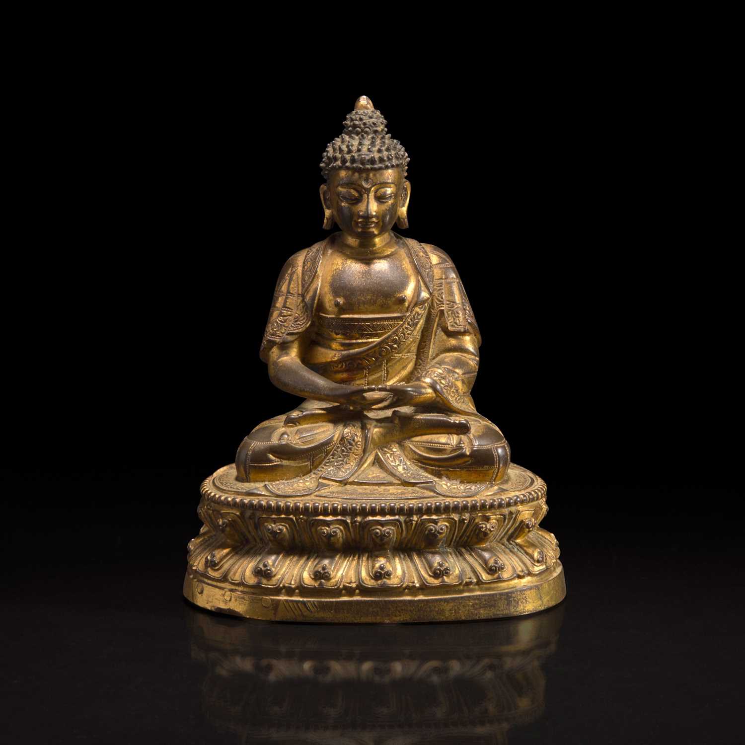 Lot 43 - A Sino-Tibetan gilt bronze Buddha 中原或藏传佛教鎏金铜造像