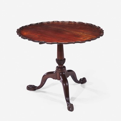 Lot 104 - A Chippendale carved mahogany tilt-top tea table