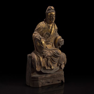 Lot 53 - A Chinese gilt-lacquered stucco figurine of Guanyin 泥塑鎏金观音
