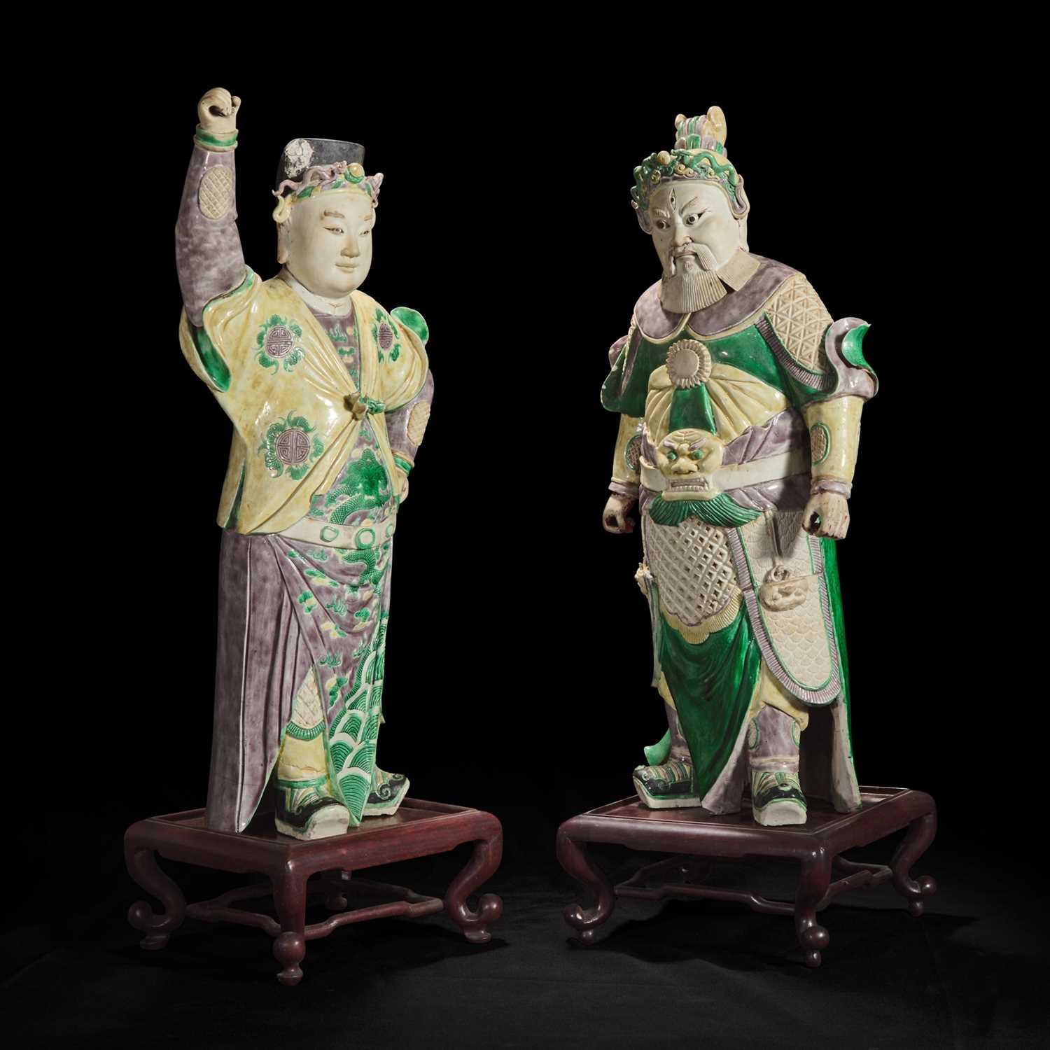 Lot 92 - An unusual pair of large Chinese famille-verte decorated porcelain guardians 五彩门神一对