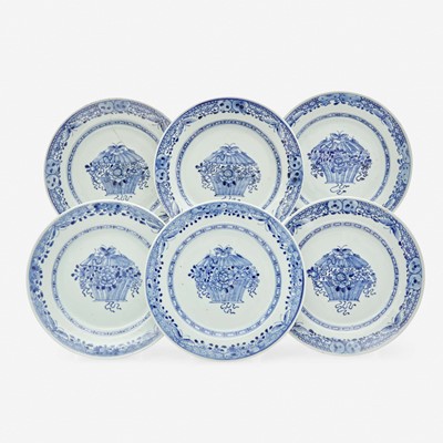 Lot 155 - A set of six Chinese Export porcelain blue and white plates with "floral basket" motif