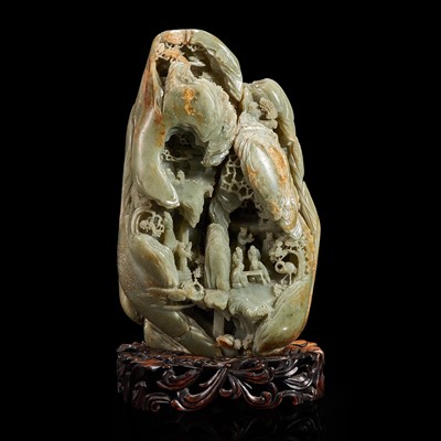 Lot 159 - A Large Chinese carved celadon and russet jade mountain and wood stand