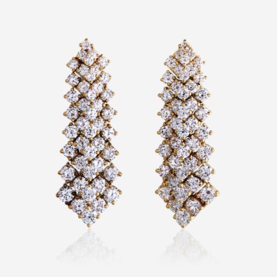 Lot 25 - A pair of diamond and eighteen karat gold earrings