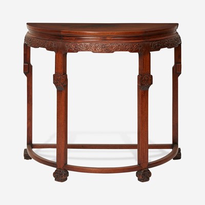 Lot 59 - A Chinese carved hardwood demilune table 硬木月牙桌