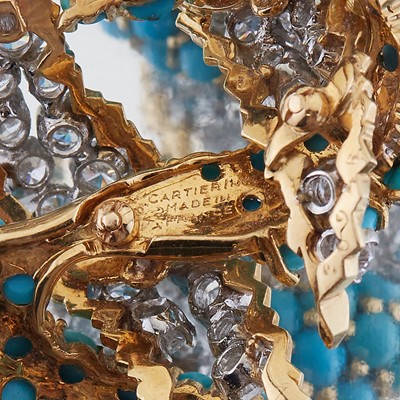 Lot 21 - A diamond, turquoise, and eighteen karat gold brooch with matching ear clips, Cartier