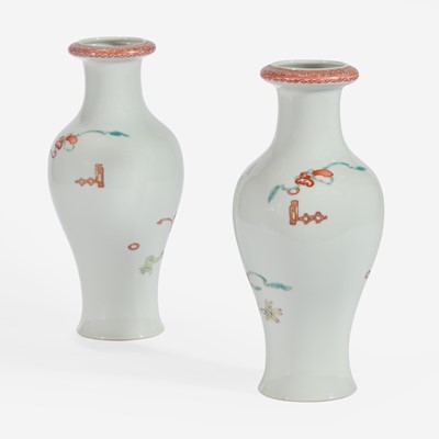 Lot 38 - A pair of famille rose-decorated porcelain baluster vases 居仁堂粉彩瓷瓶一对
