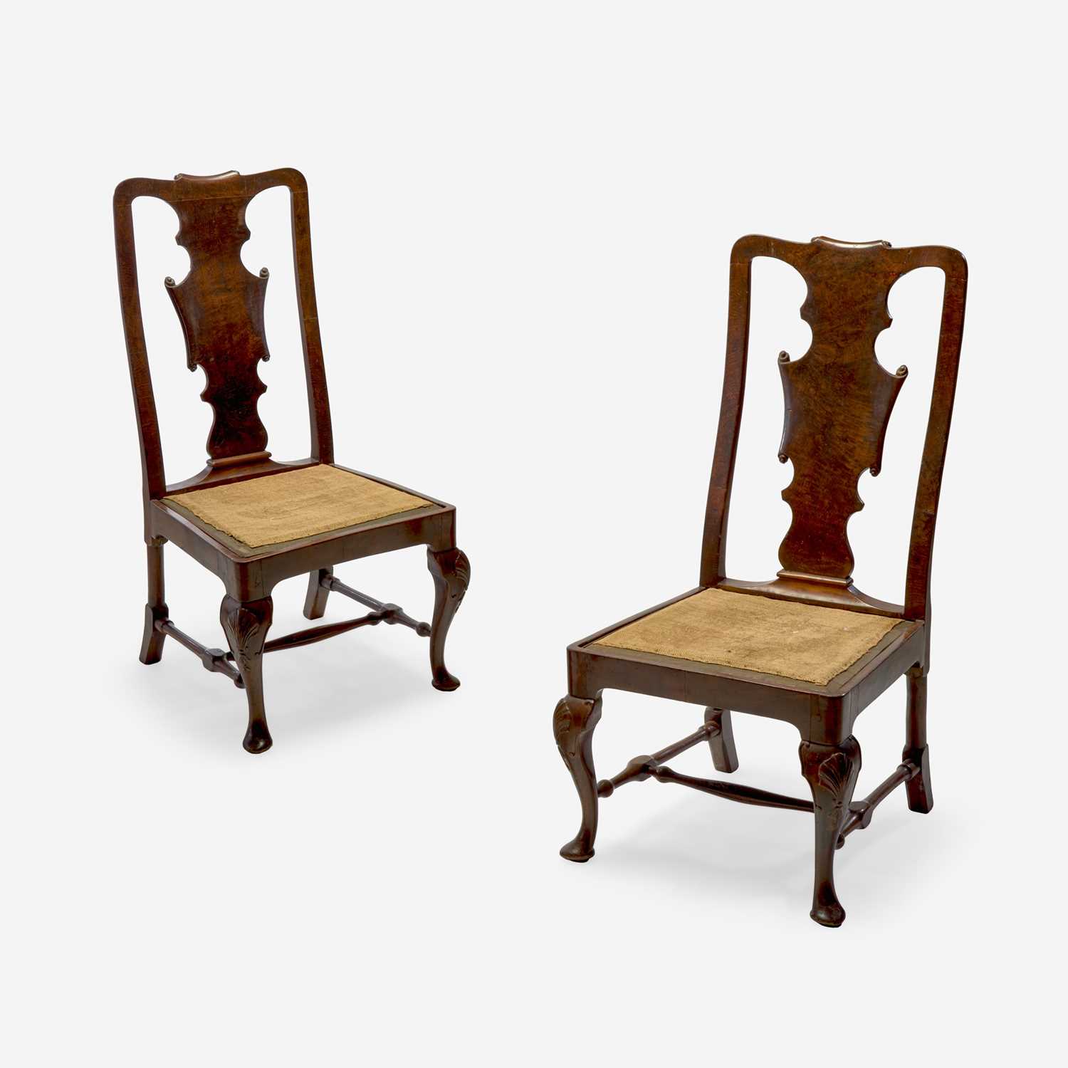 Lot 53 - A pair of Queen Anne / George I carved walnut and burl walnut veneered side chairs