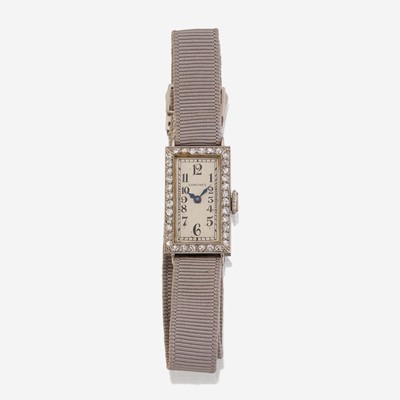 Lot 179 - An Art Deco platinum and diamond gros grain strap watch, Longines
