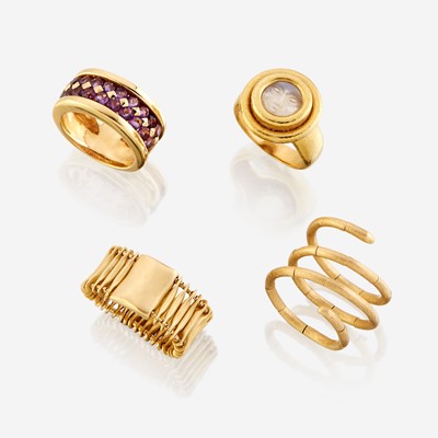 Lot 165 - A collection of four eighteen karat gold rings