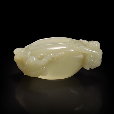 Lot 130 - A Chinese carved creamy-white jade "Boys" coupe 白玉童子水盂