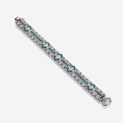 Lot 66 - An Art Deco diamond, emerald, and platinum bracelet